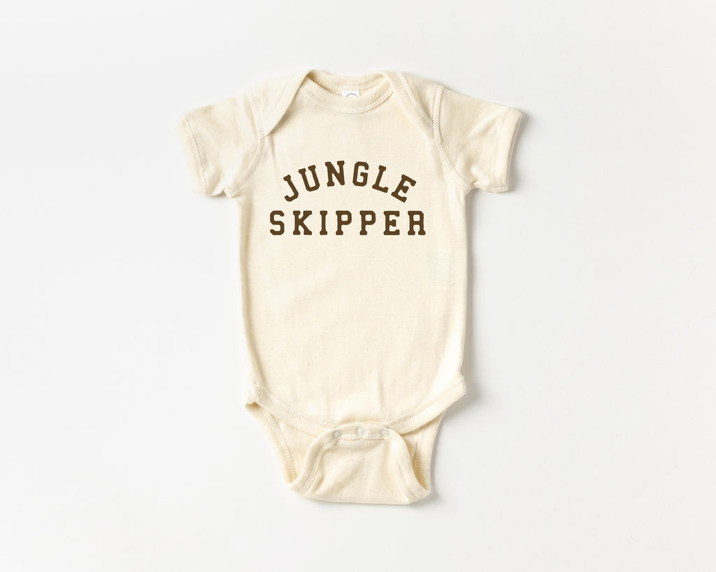 Beige baby bodysuit with 'Jungle Skipper' text