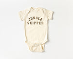 Load image into Gallery viewer, Beige baby bodysuit with &#39;Jungle Skipper&#39; text

