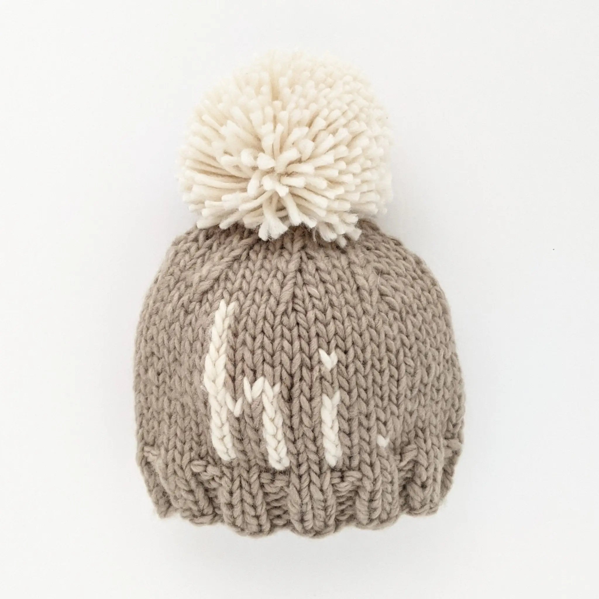 hi. Pebble Pom Pom Beanie Hat
