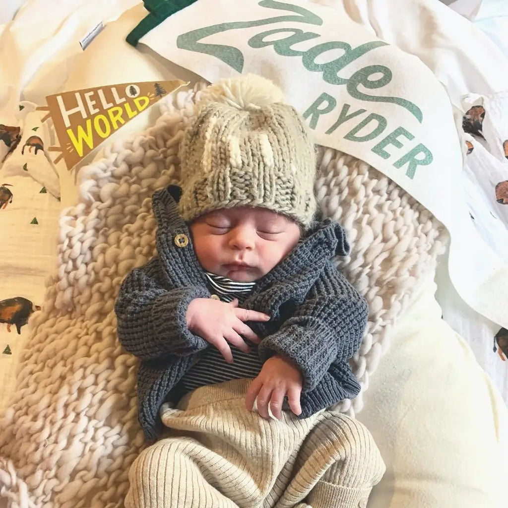 hi. Pebble Pom Pom Beanie Hat