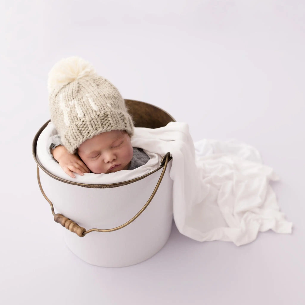 hi. Pebble Pom Pom Beanie Hat