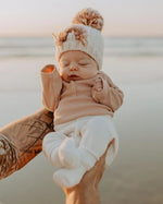 Load image into Gallery viewer, Mauve Rainbow Pom Pom Beanie Hat
