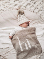 Load image into Gallery viewer, Pebble Buffalo Check Pom Pom Beanie Hat
