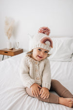 Load image into Gallery viewer, Mauve Rainbow Pom Pom Beanie Hat
