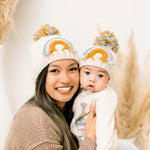 Load image into Gallery viewer, Teal Rainbow Pom Pom Beanie Hat
