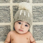 hi. Pebble Pom Pom Beanie Hat